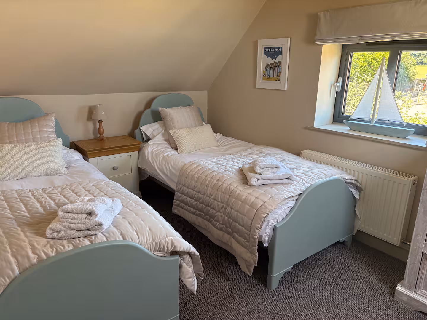 The first-floor twin bedroom