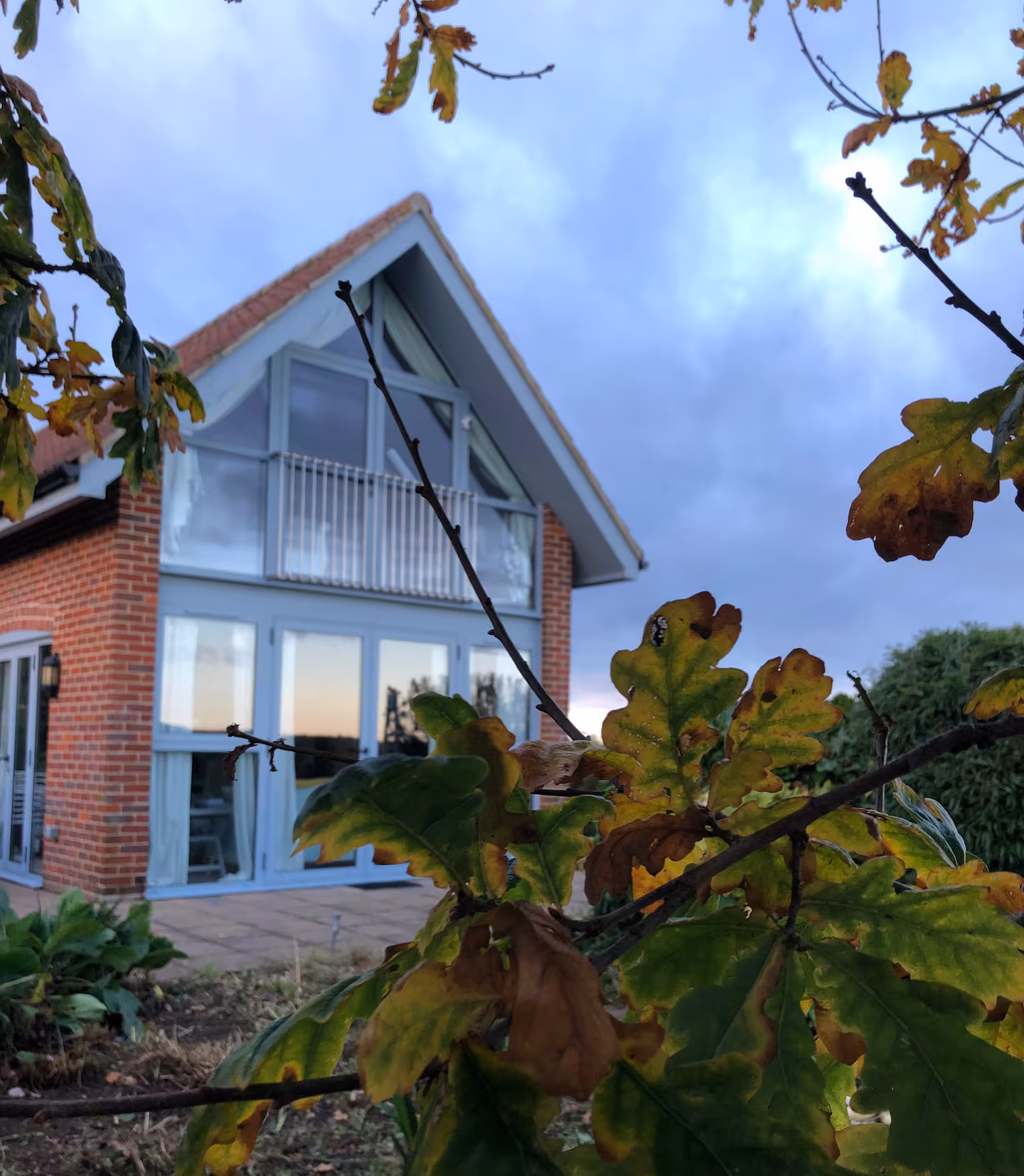 The cottage and garden at dusk
